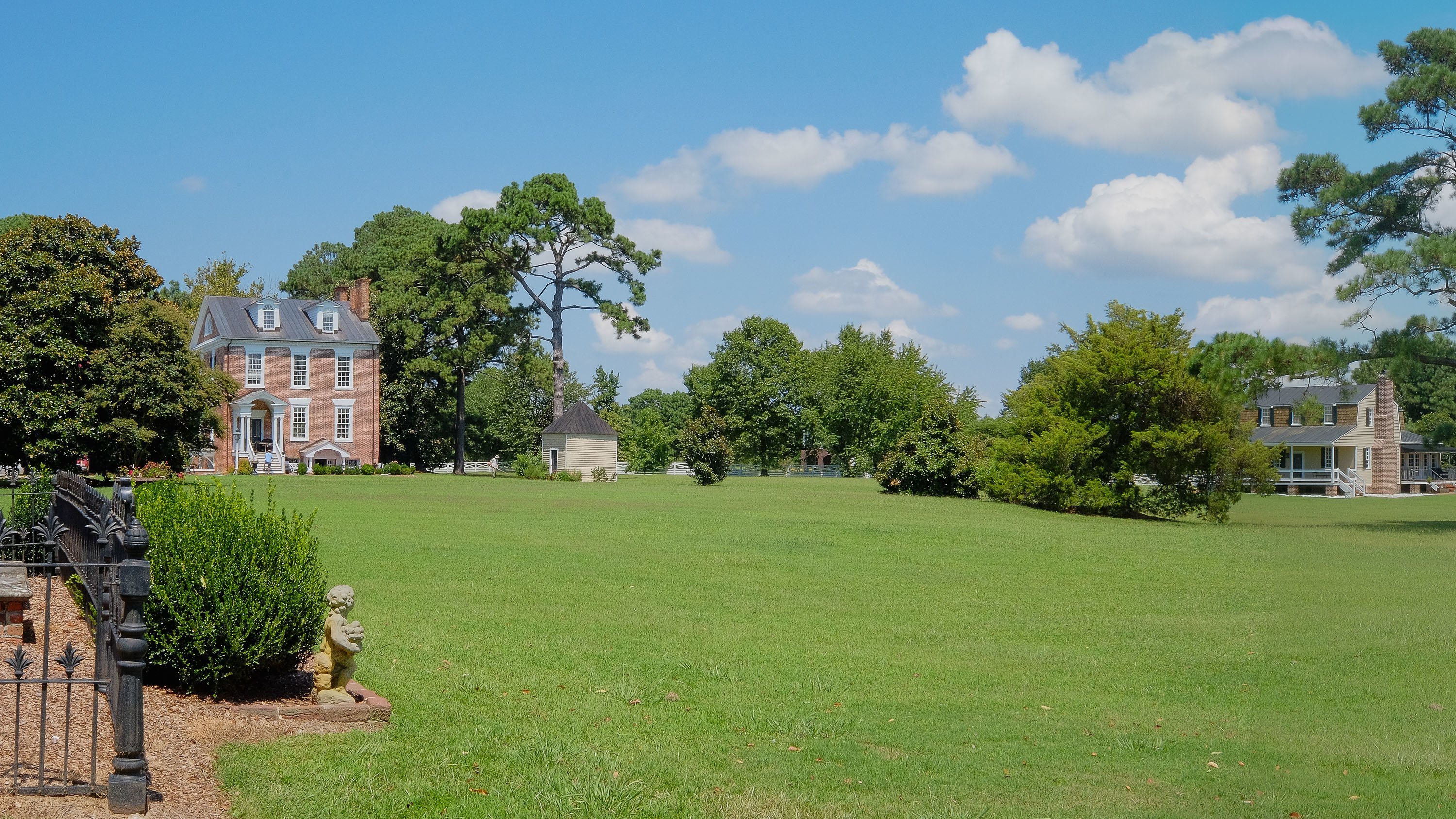 The open greensward of the Mulberry Hill manor house seen from the shore of the Albemarle Sound